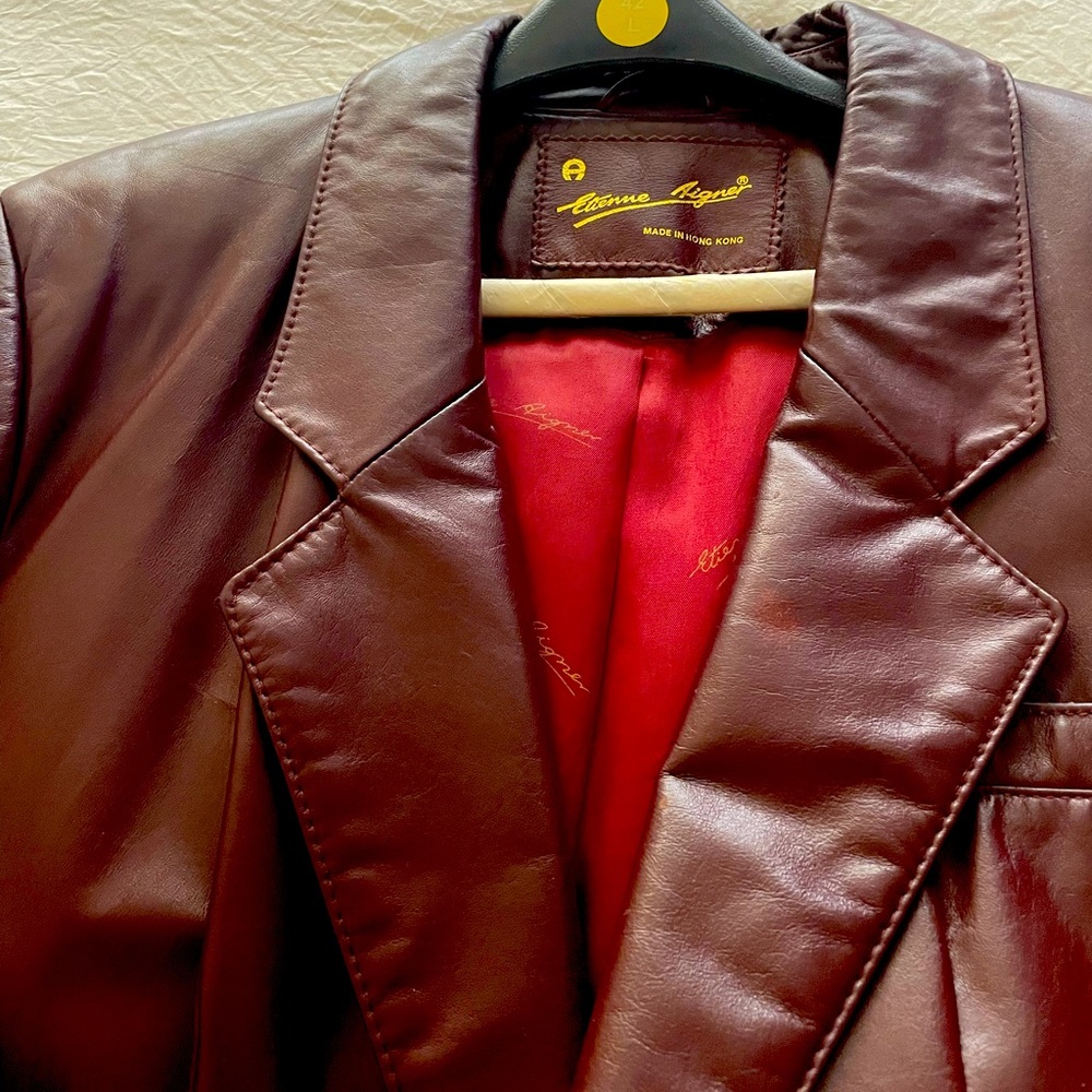 Etienne Aigner burgundy leather jacket size 16. Like new.